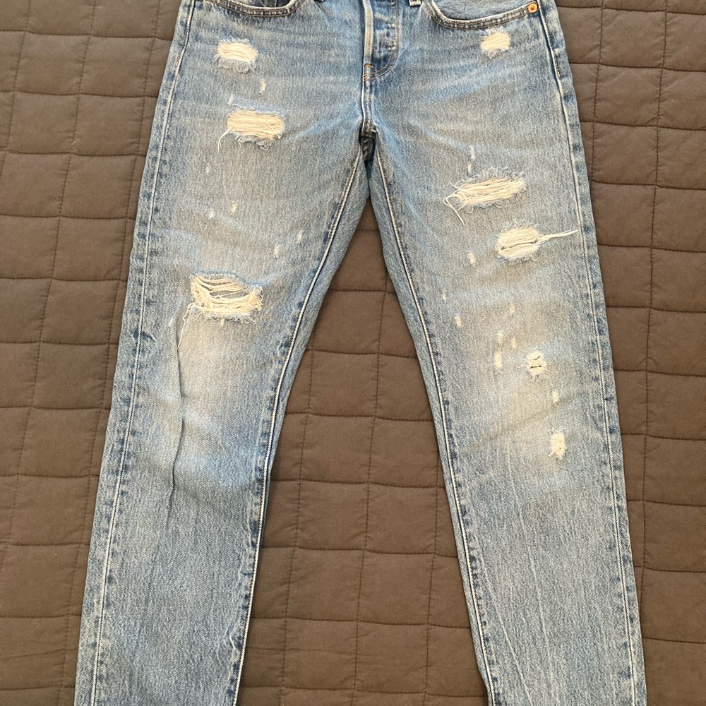 Women’s Levi’s 501 T Tapered jeans. Size 26. Button fly. Excellent condition.